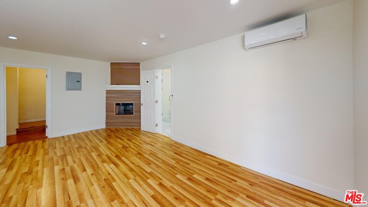 Empty room, Fireplace, Interior, Recessed Lighting, Wood Texture Flooring