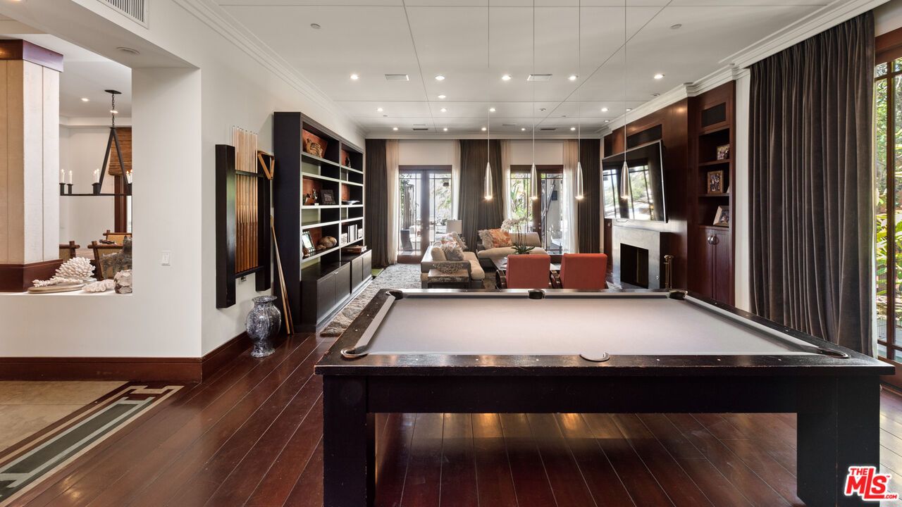 Billiard Table, Fireplace, Game Room, Interior, Pendant Lights, Recessed Lighting, Wood Texture Flooring