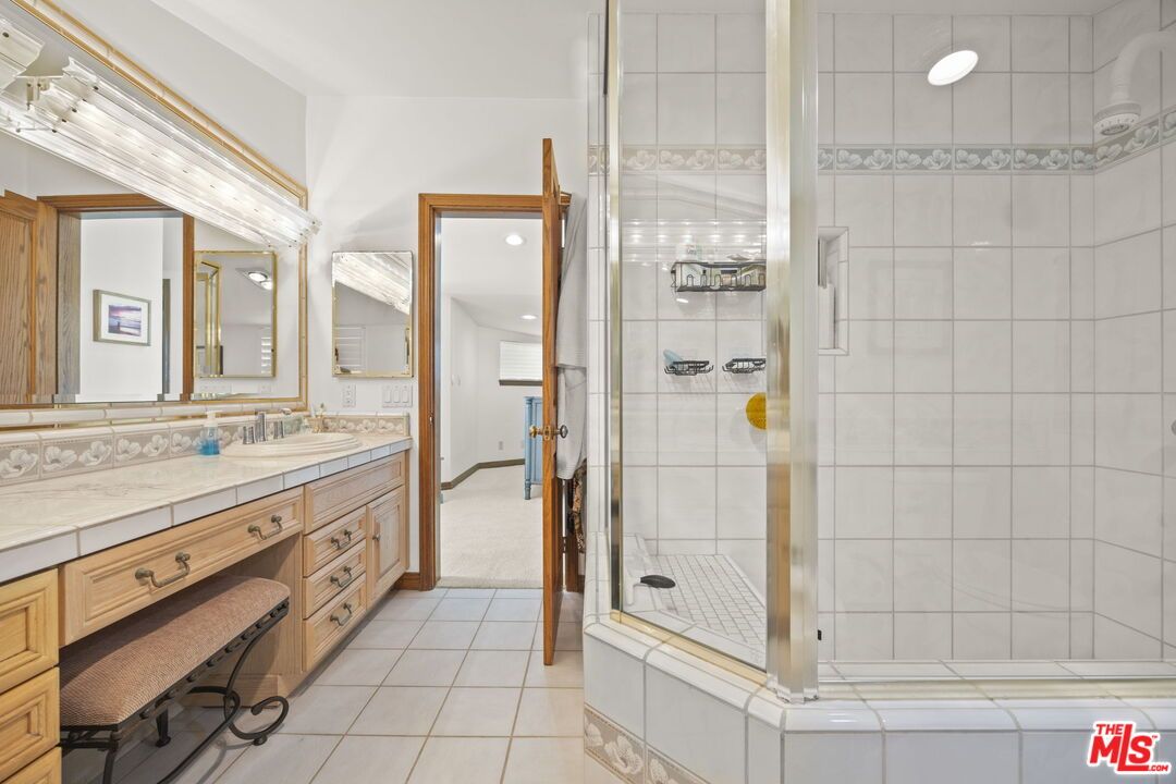 Bathroom, Dual Sink Vanities, Glass Shower, Interior, Recessed Lighting, Tile Countertops