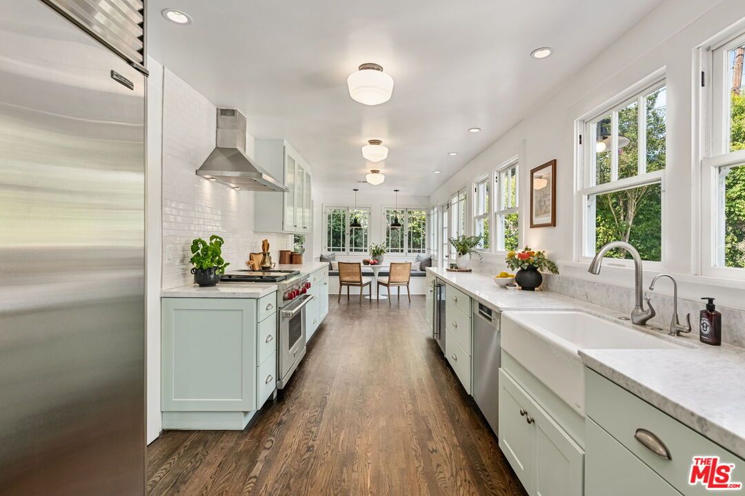 Dining room, Interior, Kitchen, Recessed Lighting, Stainless Steel Appliances, Wood Texture Flooring