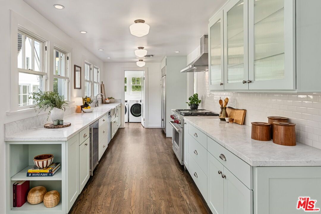 Interior, Kitchen, Recessed Lighting, Stainless Steel Appliances, Washer, Wood Texture Flooring