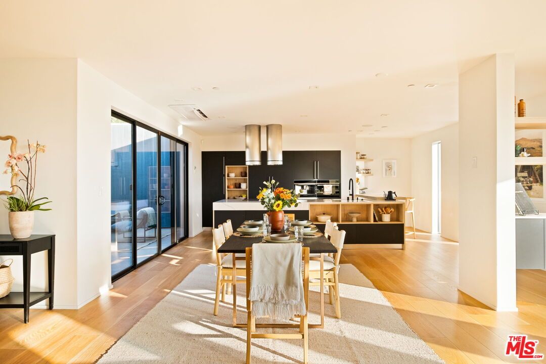 Dining room, Interior, Kitchen, Recessed Lighting, Stainless Steel Appliances, Wood Texture Flooring