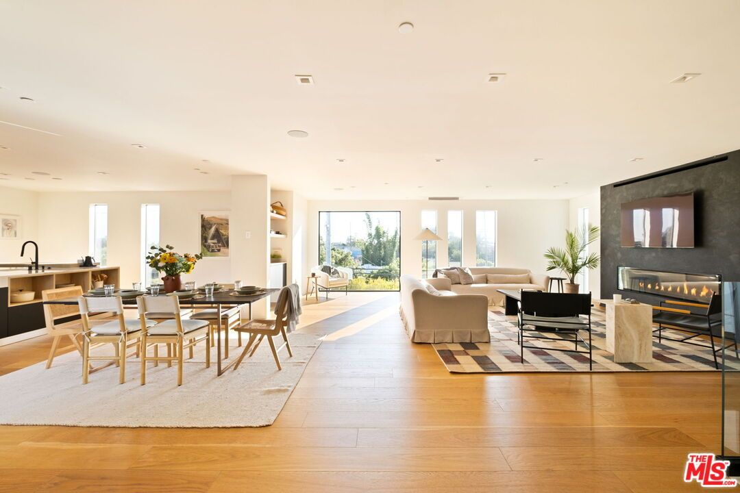 Dining room, Fireplace, Interior, Living room, Recessed Lighting, Wood Texture Flooring