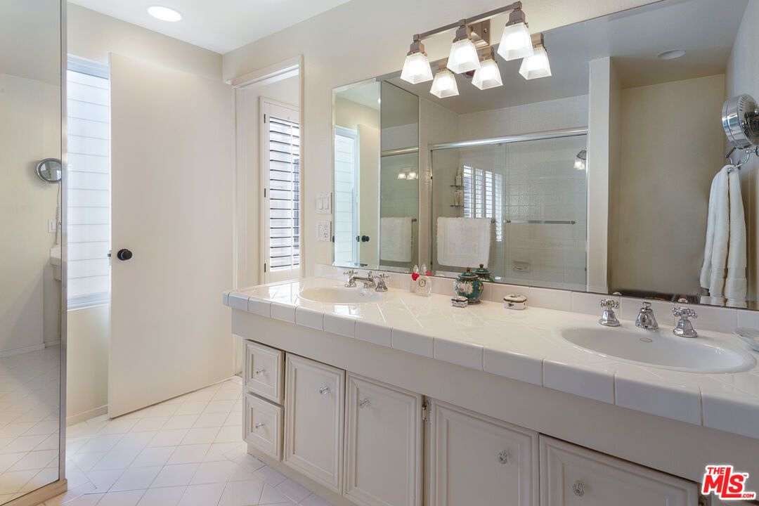 Bathroom, Dual Sink Vanities, Glass Shower, Interior, Recessed Lighting, Tile Countertops