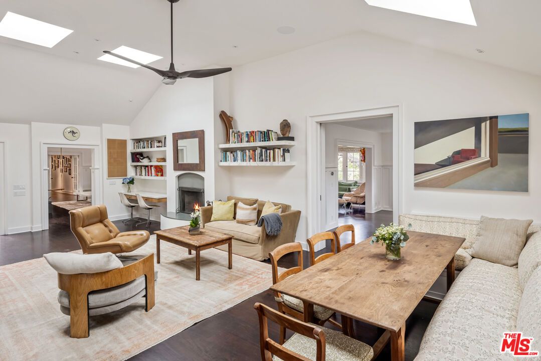 Dining room, Fireplace, Interior, Living room, Recessed Lighting, Wood Texture Flooring