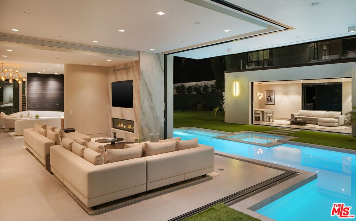 Chandelier, Fireplace, Interior, Living room, Pendant Lights, Pool, Recessed Lighting
