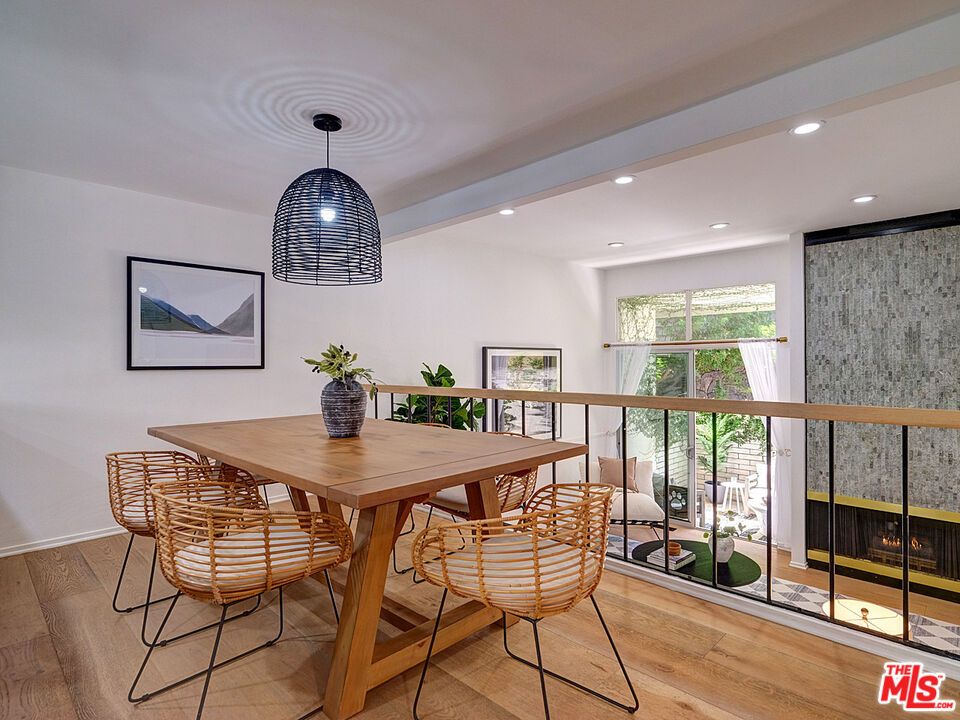 Dining room, Fireplace, Interior, Pendant Lights, Recessed Lighting, Wood Texture Flooring