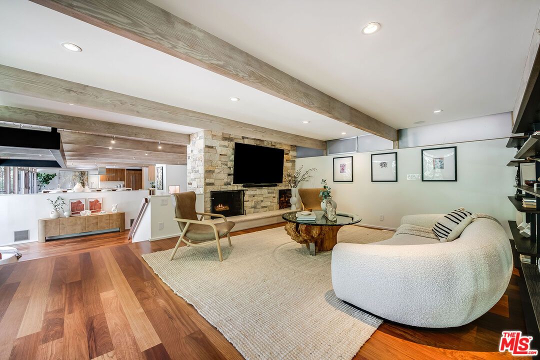 Fireplace, Interior, Living room, Recessed Lighting, Stone Walls, Wooden Beams, Wood Texture Flooring