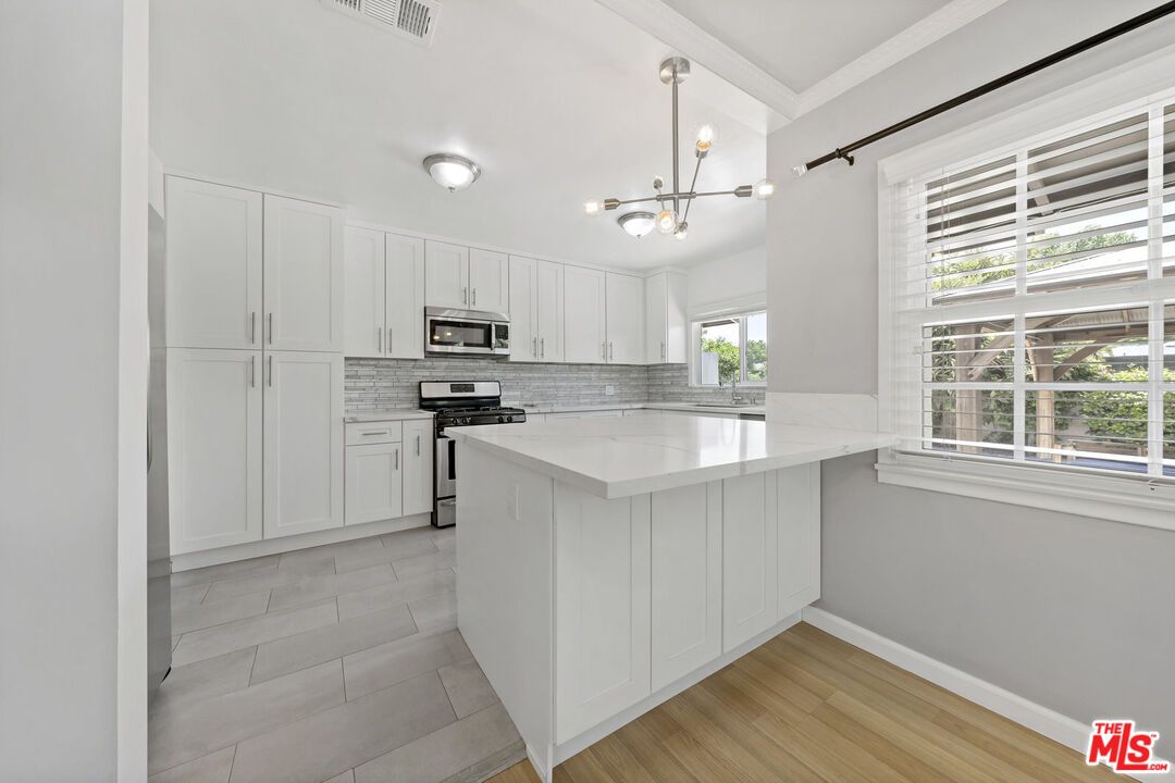 Interior, Kitchen, Pendant Lights, Stainless Steel Appliances, Wood Texture Flooring