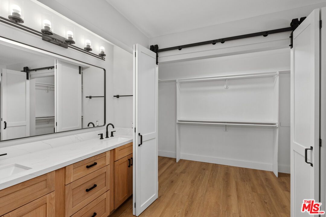 Bathroom, Dual Sink Vanities, Interior, Walk-in Closets, Wood Texture Flooring