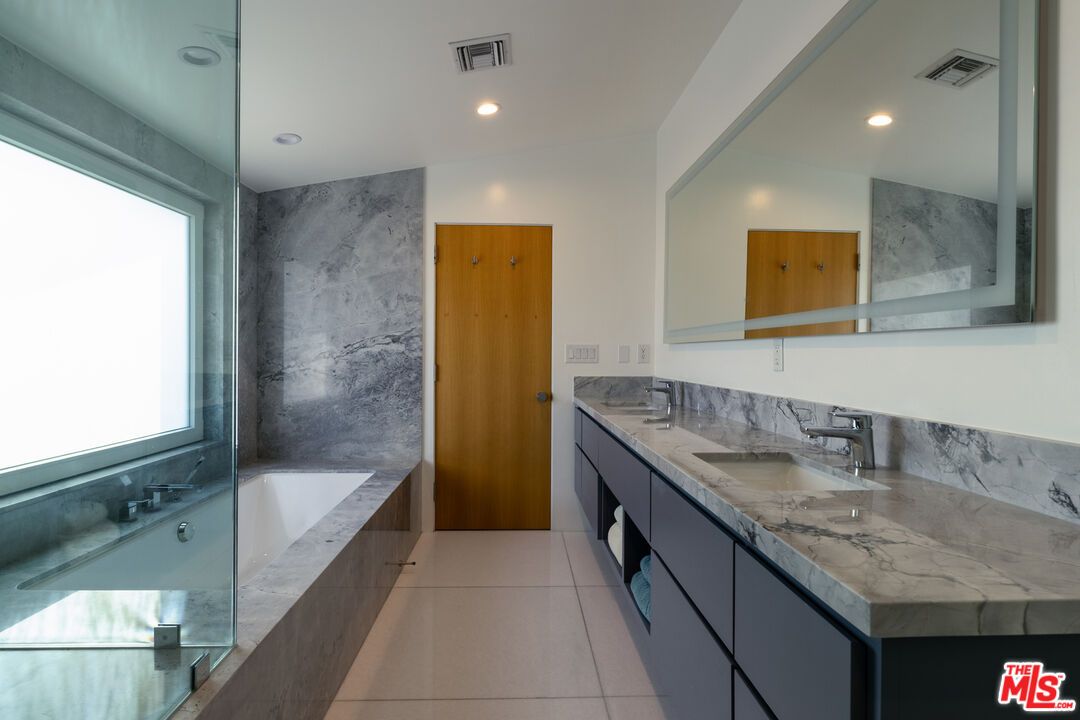 Bathroom, Dual Sink Vanities, Interior, Marble Walls, Recessed Lighting
