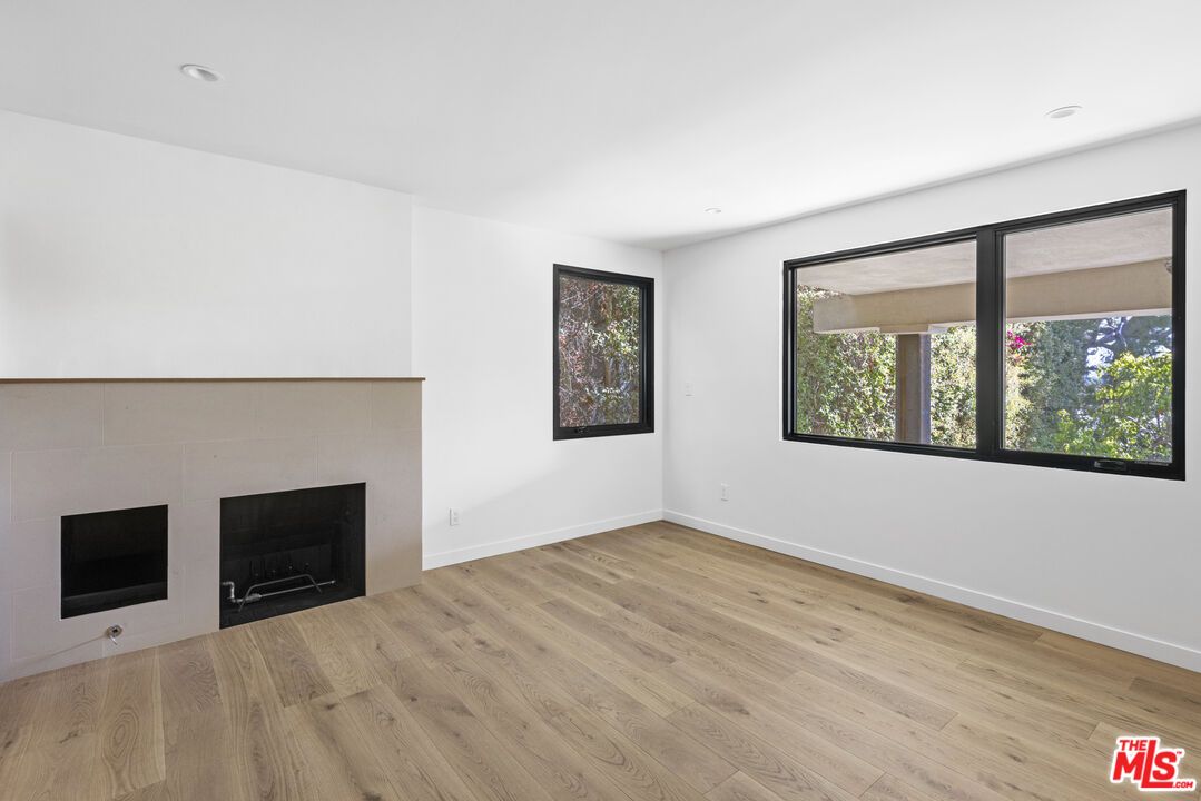 Empty room, Fireplace, Interior, Recessed Lighting, Wood Texture Flooring