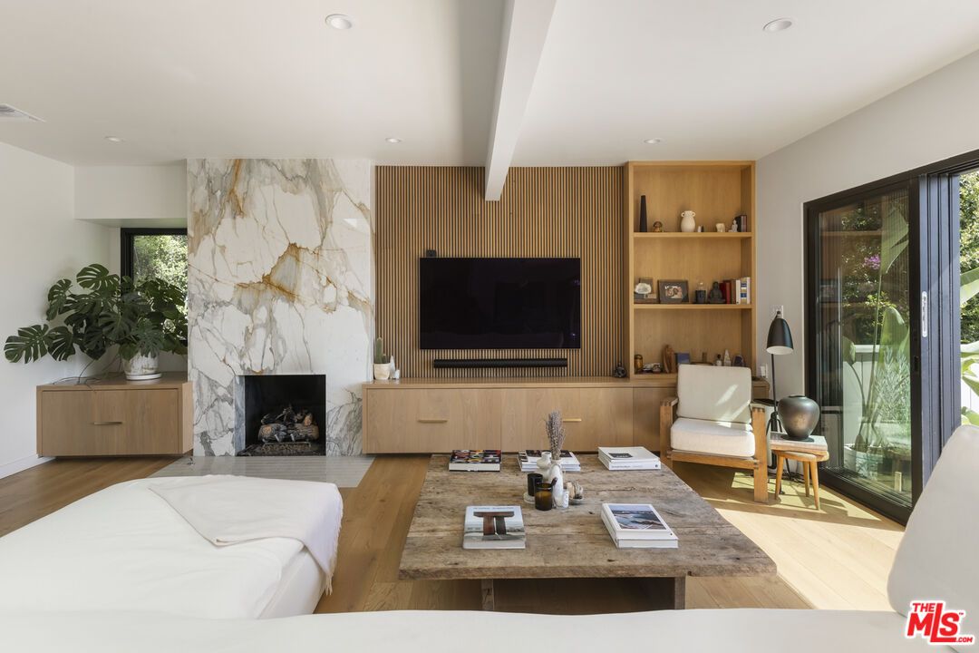 Fireplace, Interior, Living room, Marble Walls, Recessed Lighting, Wood Texture Flooring