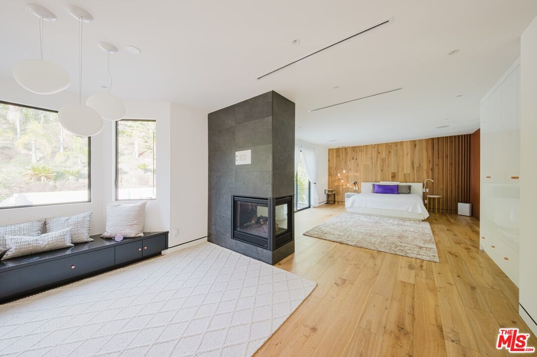 Bedroom, Fireplace, Interior, Pendant Lights, Recessed Lighting, Wood Texture Flooring, Wooden Walls