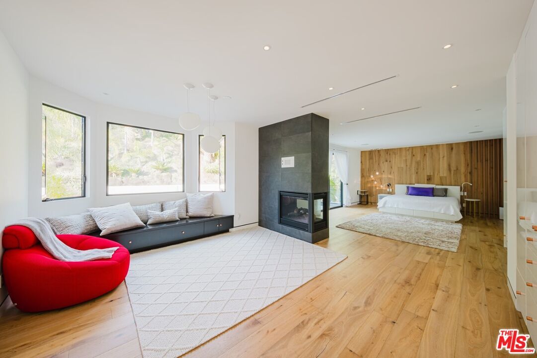 Bedroom, Fireplace, Interior, Pendant Lights, Recessed Lighting, Wood Texture Flooring, Wooden Walls