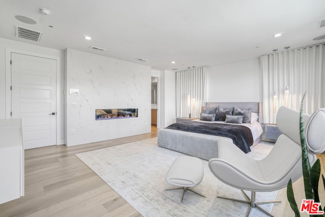 Bedroom, Fireplace, Interior, Marble Walls, Recessed Lighting, Wood Texture Flooring