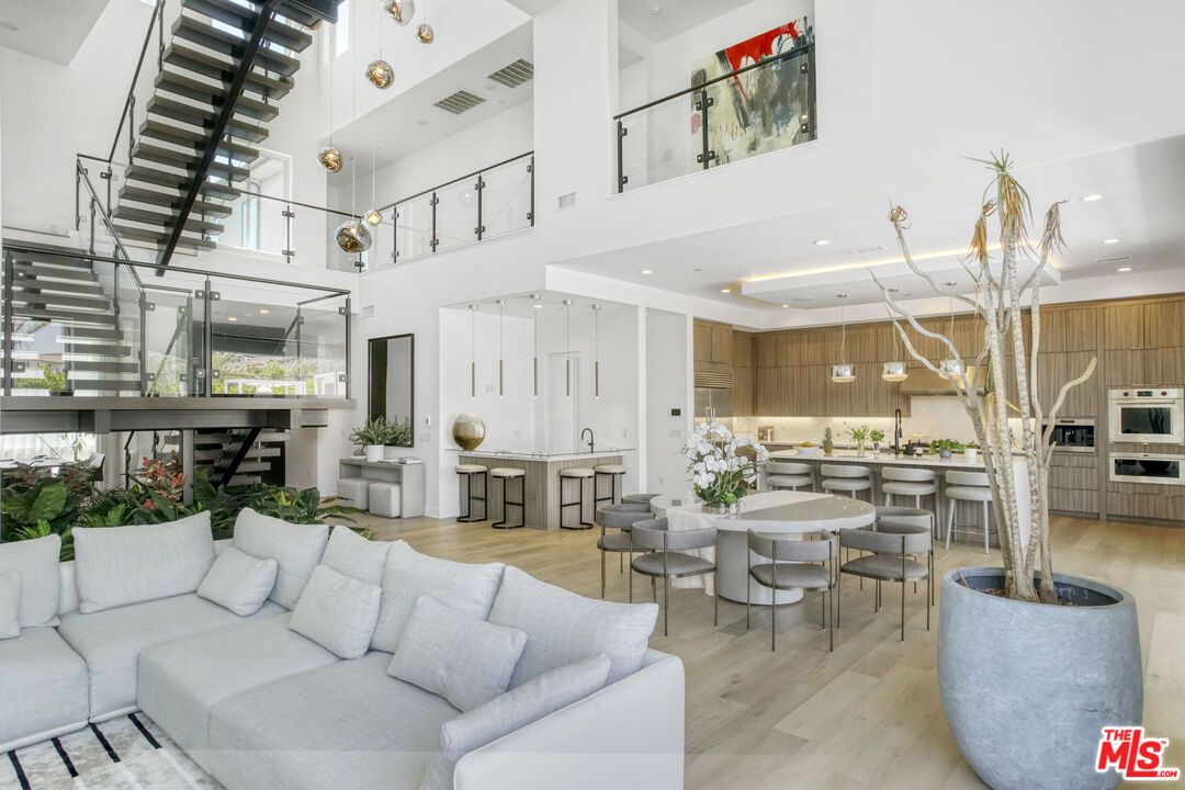 Dining room, Interior, Kitchen, Living room, Pendant Lights, Recessed Lighting, Stainless Steel Appliances, Wood Texture Flooring