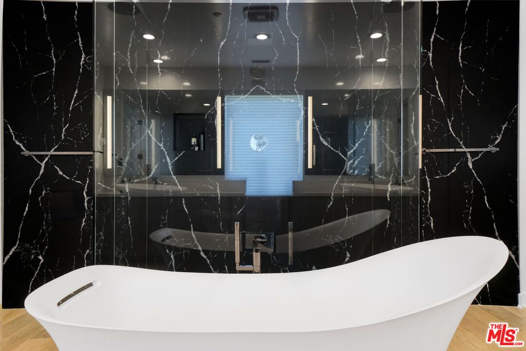Bathroom, Free Standing Baths, Glass Shower, Interior, Marble Walls, Recessed Lighting