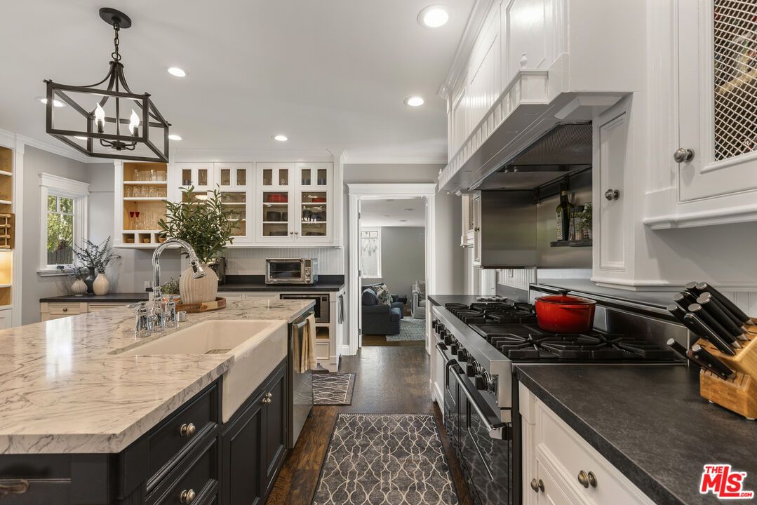 Chandelier, Interior, Kitchen, Pendant Lights, Recessed Lighting, Stainless Steel Appliances, Wood Texture Flooring