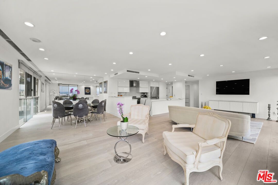 Dining room, Interior, Kitchen, Living room, Recessed Lighting, Stainless Steel Appliances, Wood Texture Flooring