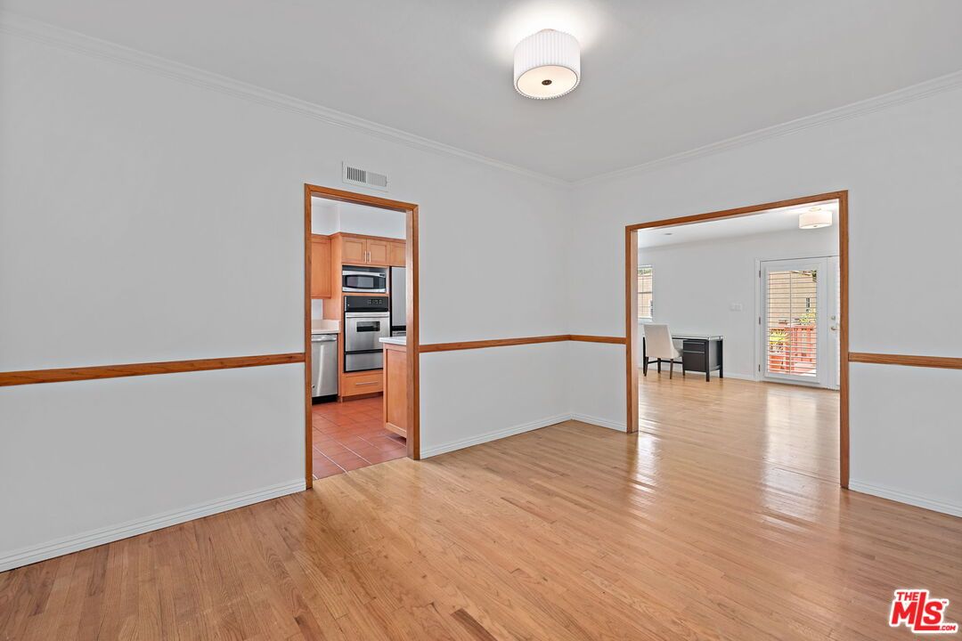 Empty room, Interior, Kitchen, Stainless Steel Appliances, Wood Texture Flooring