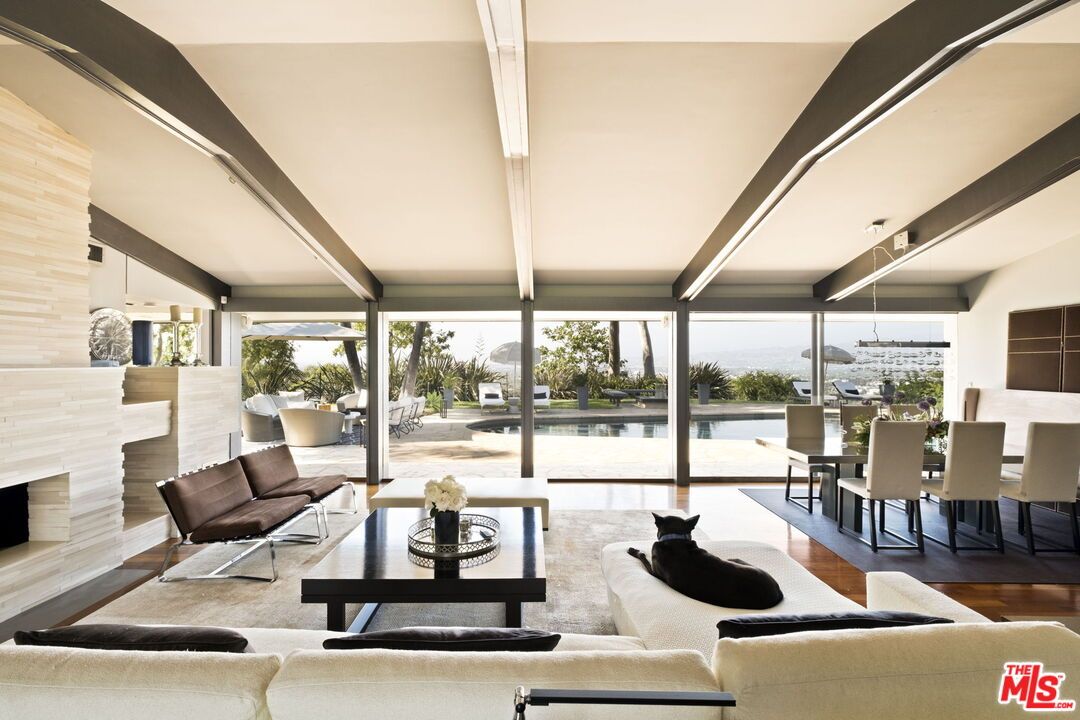 Dining room, Fireplace, Interior, Living room, Pendant Lights, Water, Wood Texture Flooring