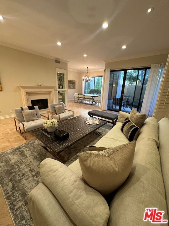 Chandelier, Dining room, Fireplace, Interior, Living room, Recessed Lighting, Wood Texture Flooring