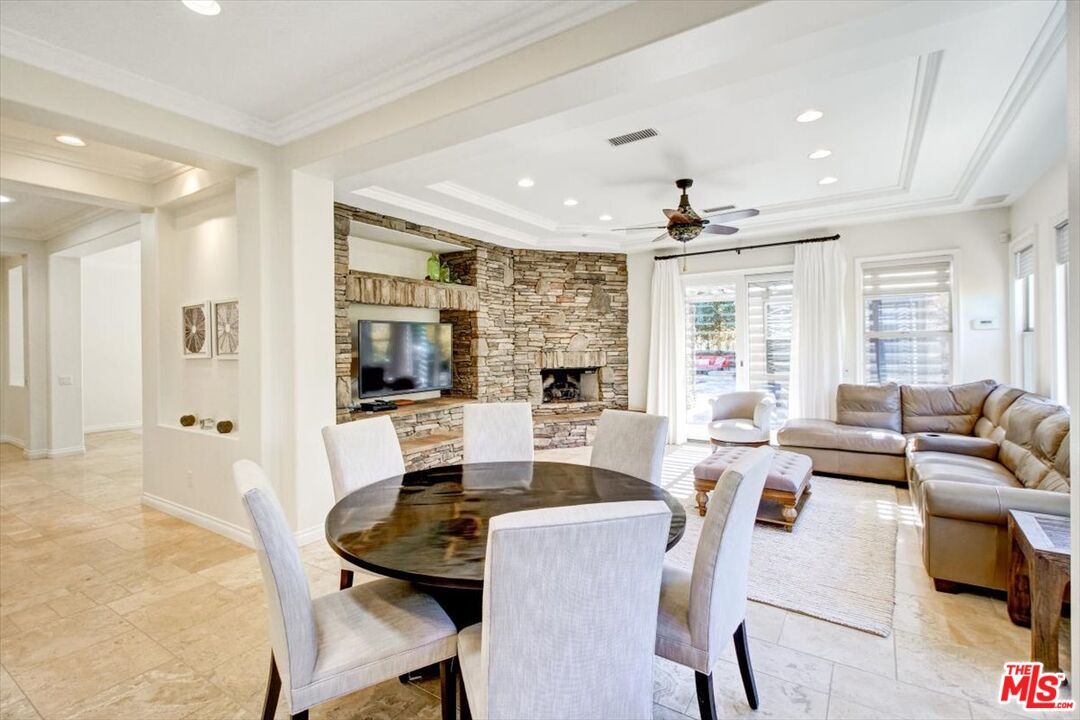 Dining room, Fireplace, Interior, Living room, Recessed Lighting, Stone Walls