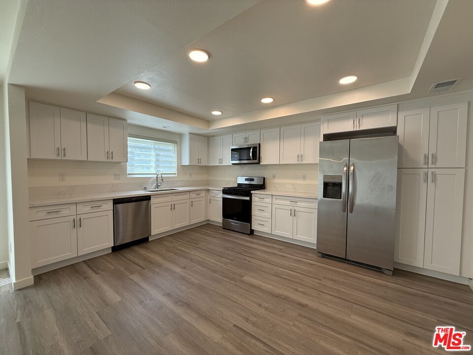 Interior, Kitchen, Recessed Lighting, Stainless Steel Appliances, Wood Texture Flooring