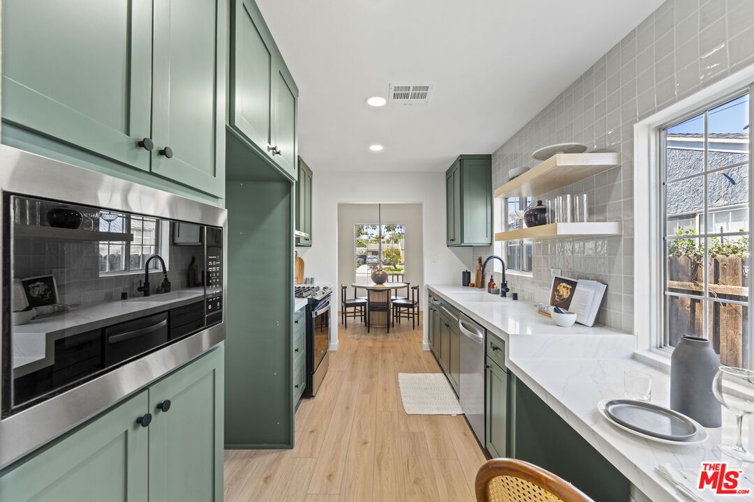 Dining room, Interior, Kitchen, Recessed Lighting, Stainless Steel Appliances, Wood Texture Flooring