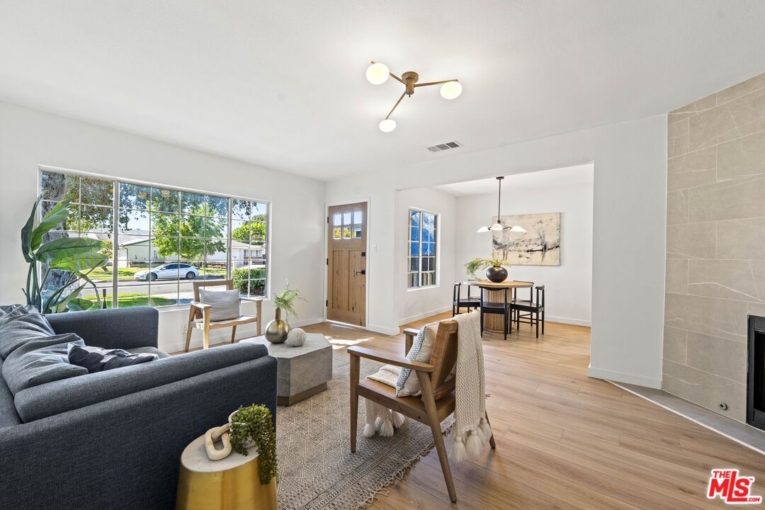 Dining room, Fireplace, Interior, Living room, Pendant Lights, Wood Texture Flooring