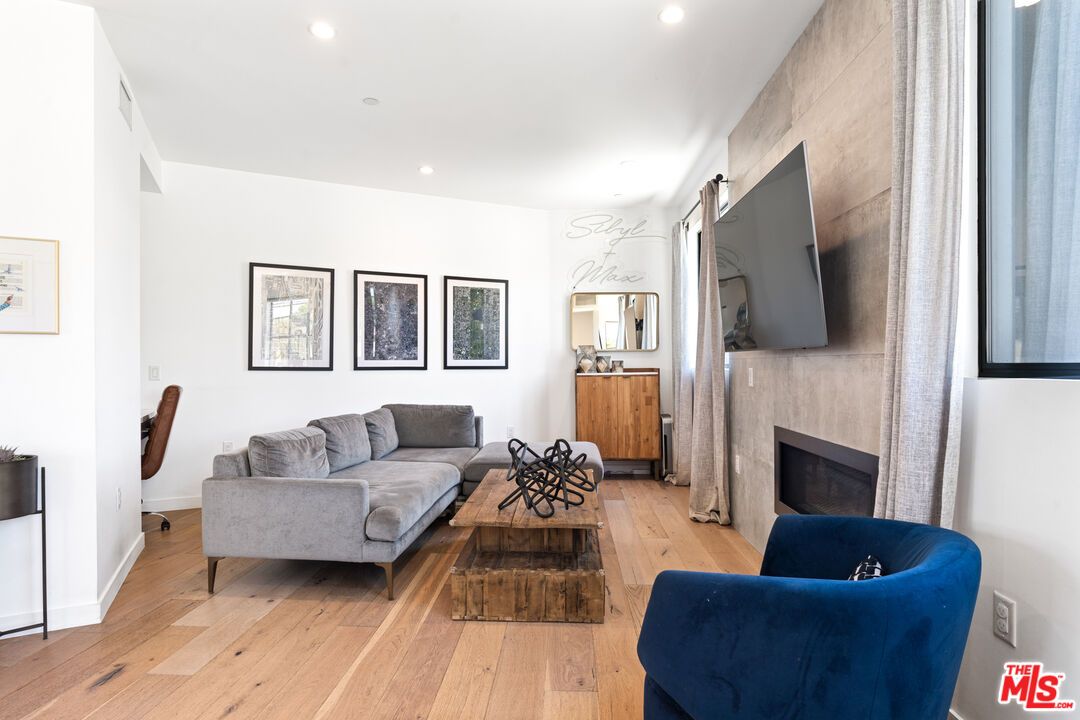 Fireplace, Interior, Living room, Recessed Lighting, Wood Texture Flooring