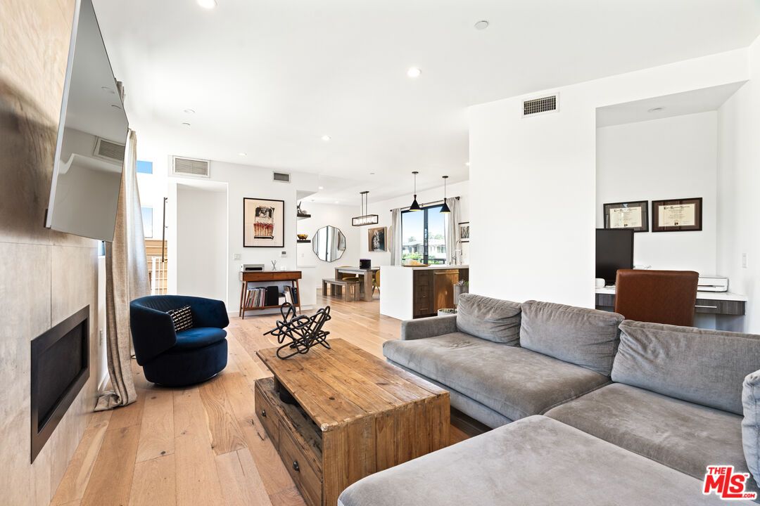 Dining room, Fireplace, Interior, Kitchen, Living room, Pendant Lights, Recessed Lighting, Wood Texture Flooring