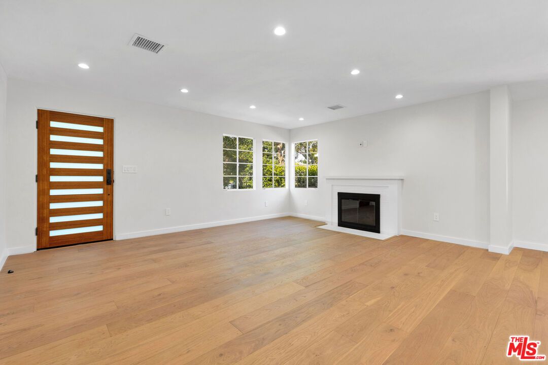 Empty room, Fireplace, Interior, Recessed Lighting, Wood Texture Flooring