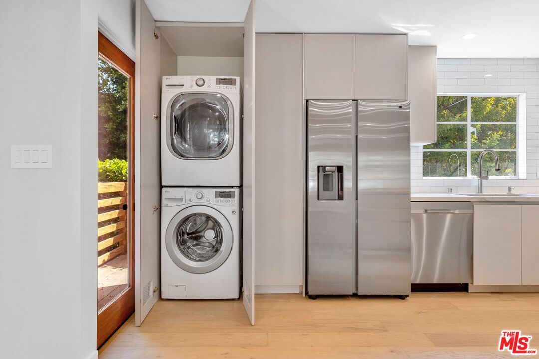 Interior, Kitchen, Recessed Lighting, Stainless Steel Appliances, Washer, Wood Texture Flooring