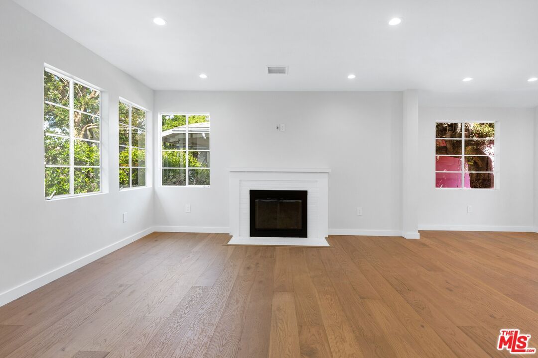 Empty room, Fireplace, Interior, Recessed Lighting, Wood Texture Flooring
