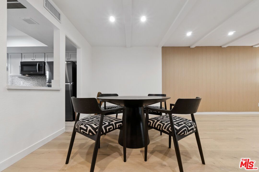 Dining room, Interior, Kitchen, Recessed Lighting, Stainless Steel Appliances, Wood Texture Flooring