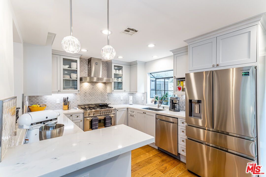 Interior, Kitchen, Pendant Lights, Recessed Lighting, Stainless Steel Appliances, Wood Texture Flooring