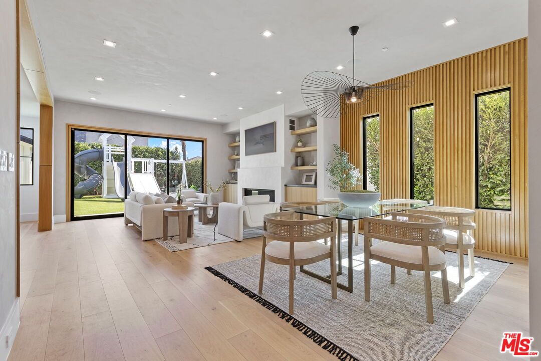 Dining room, Fireplace, Interior, Living room, Pendant Lights, Recessed Lighting, Wood Texture Flooring