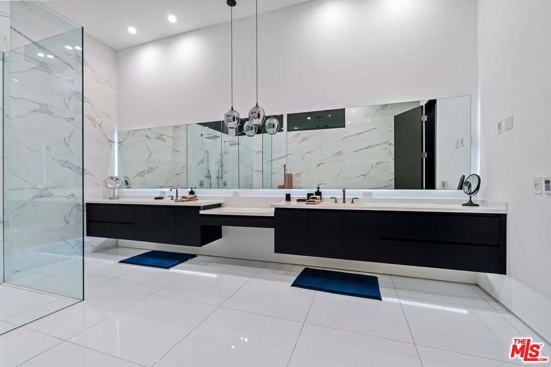 Bathroom, Dual Sink Vanities, Interior, Marble Walls, Pendant Lights, Recessed Lighting