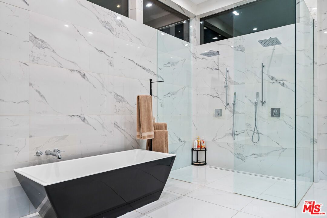 Bathroom, Free Standing Baths, Glass Shower, Interior, Marble Walls, Recessed Lighting