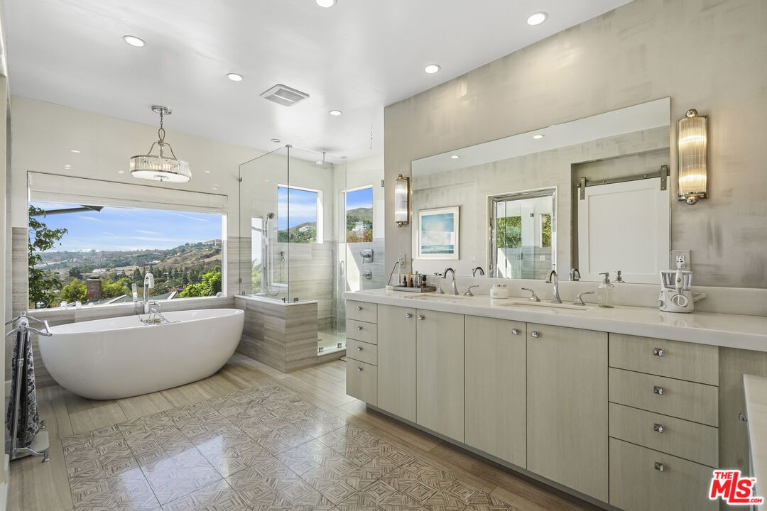Bathroom, Dual Sink Vanities, Free Standing Baths, Glass Shower, Interior, Pendant Lights, Recessed Lighting, Wood Texture Flooring