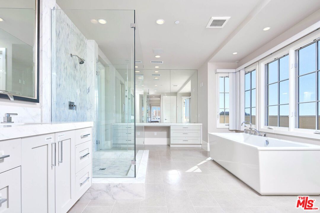 Bathroom, Dual Sink Vanities, Free Standing Baths, Glass Shower, Interior, Marble, Marble Walls, Recessed Lighting