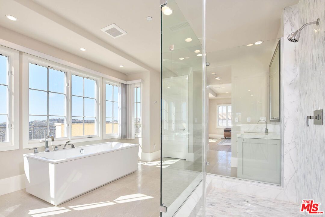 Bathroom, Free Standing Baths, Glass Shower, Interior, Marble, Marble Walls, Recessed Lighting