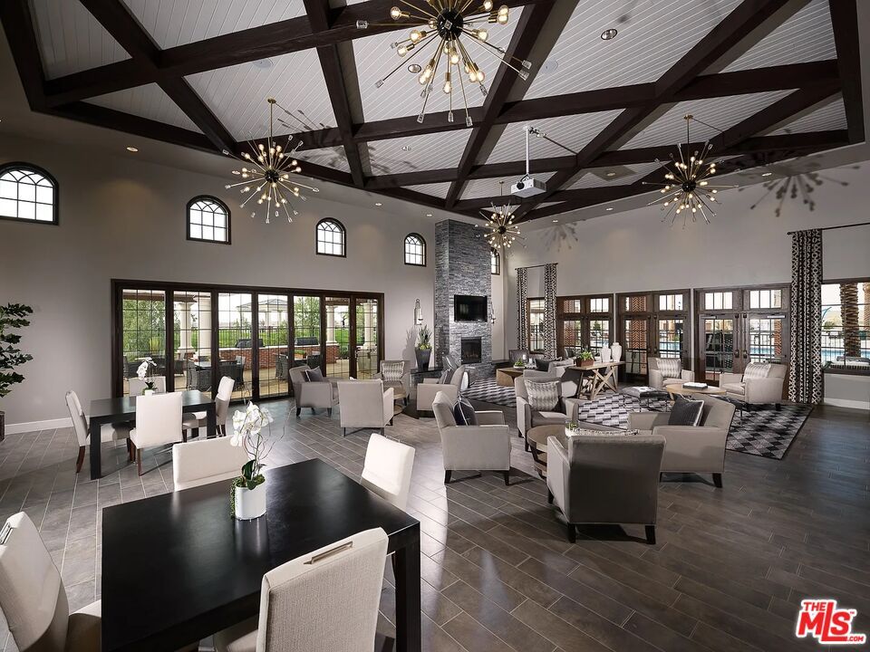Dining room, Fireplace, Interior, Living room, Pendant Lights, Recessed Lighting, Wooden Beams, Wood Texture Flooring