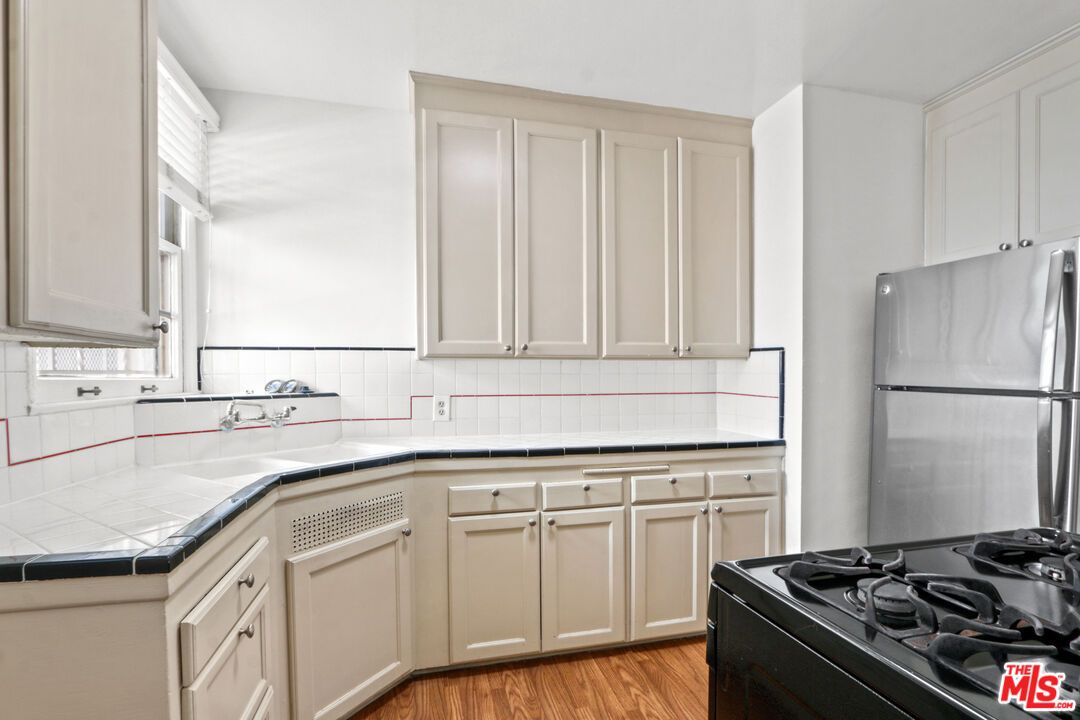 Interior, Kitchen, Tile Countertops, Wood Texture Flooring
