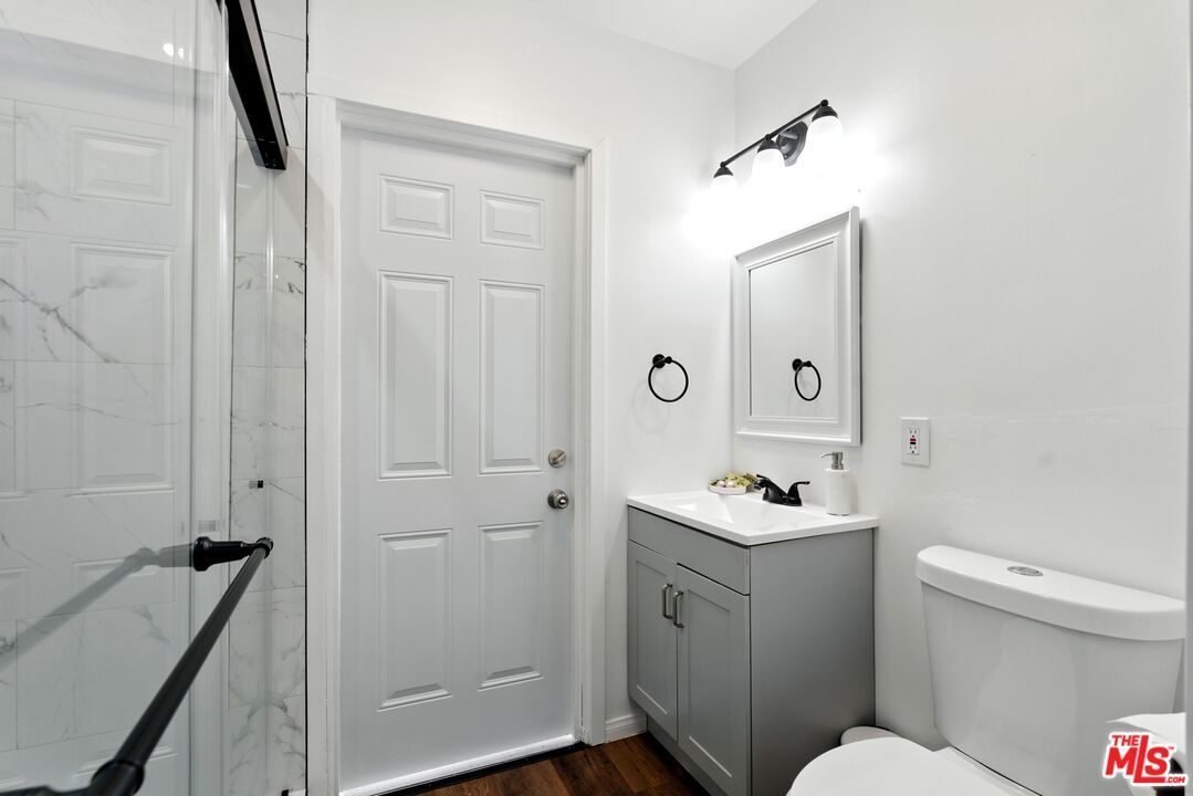 Bathroom, Glass Shower, Interior, Marble Walls, Wood Texture Flooring