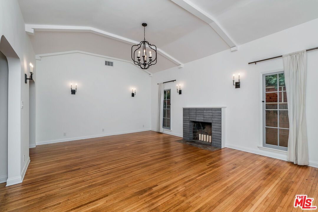 Chandelier, Empty room, Fireplace, Interior, Pendant Lights, Wood Texture Flooring