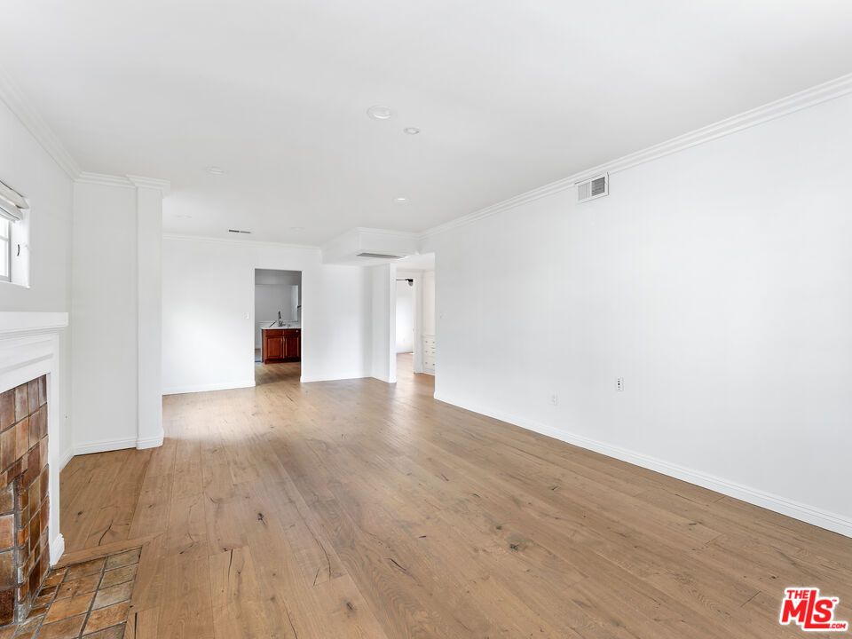 Empty room, Fireplace, Interior, Recessed Lighting, Wood Texture Flooring