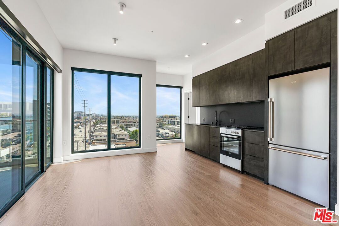 Interior, Kitchen, Recessed Lighting, Stainless Steel Appliances, Water, Wood Texture Flooring